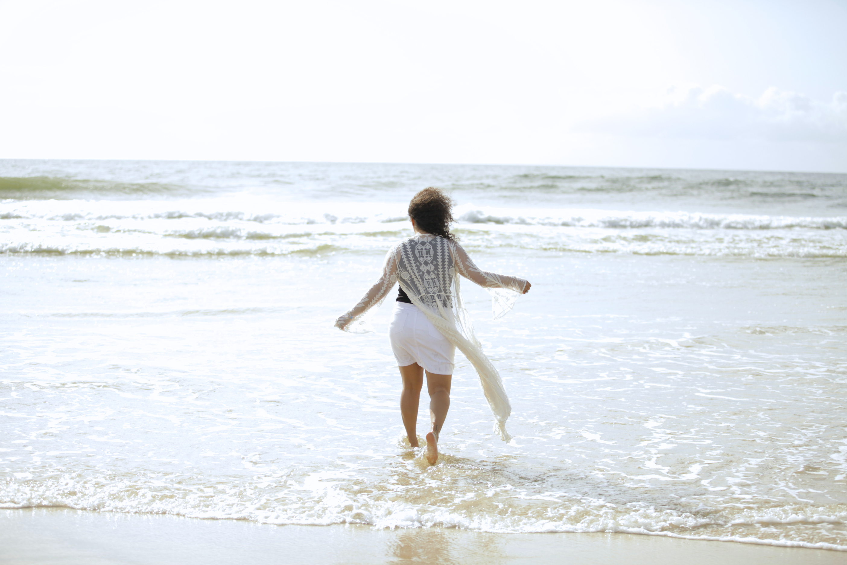 Woman standing at the beach